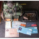 Four cylinder Austin engine with 1B1413RMG18728A on the block together with a cylinder head,