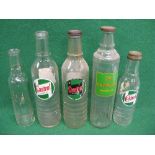 Five oil bottles with three lids to include: Castrol and BP Energol Please note descriptions are not