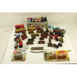 Collection of tin plate, diecast and plastic model railway items, mainly N gauge, featuring carded