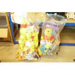 Large quantity of Winnie the Pooh teddies and figures to include boxed Story Telling Pooh, etc