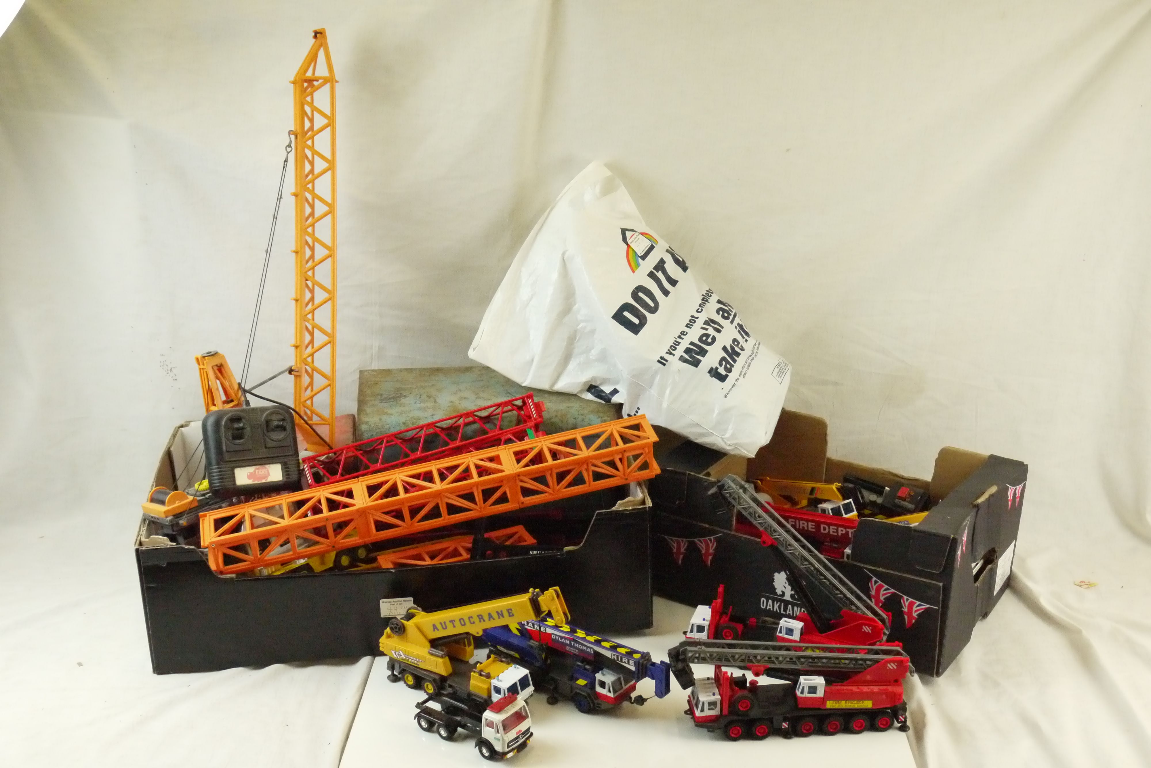 16 x Playworn diecast and plastic construction models to featuring Corgi, Dinky, etc, plus remote