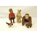 Four tinplate clockwork animals, made in Japan marked on one