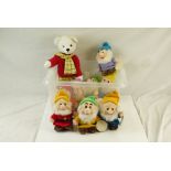 Nine Tomy Seven Dwarf plush toys, plus Rupert the Bear plush toy