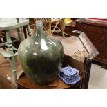 A large glass carboy plus a Blue and White Butterdish