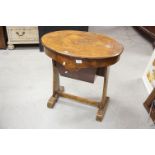 Victorian Walnut Inlaid Sewing Table, the oval hinged lid top opening to reveal a compartmented