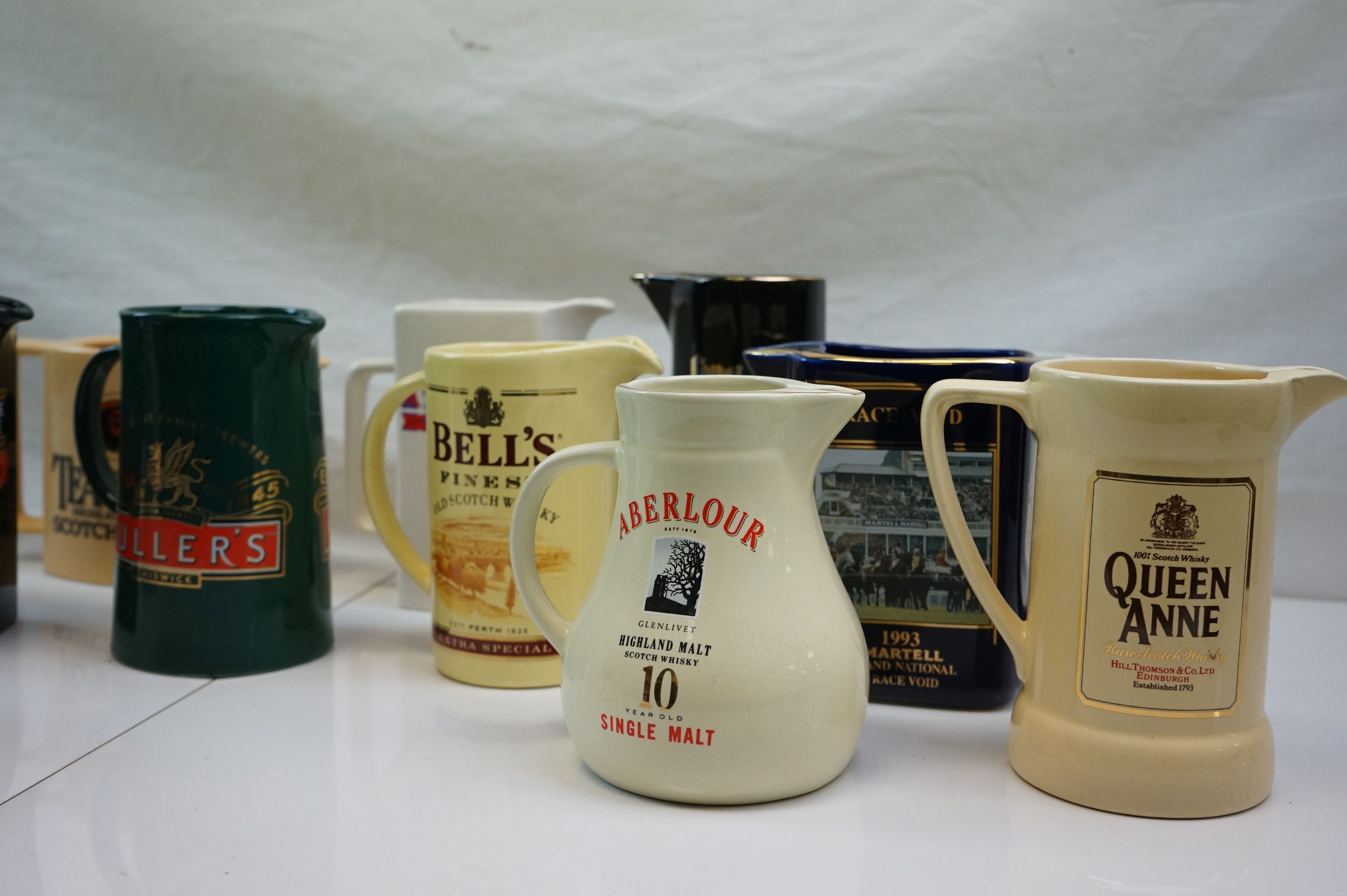 Collection of Fifteen Ceramic Pub Advertising Jugs including Wade and Martell Grand National Void - Image 3 of 5