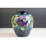 Moorcroft Globular Vase in the Clematis pattern on a green ground, Moorcroft signature to base and
