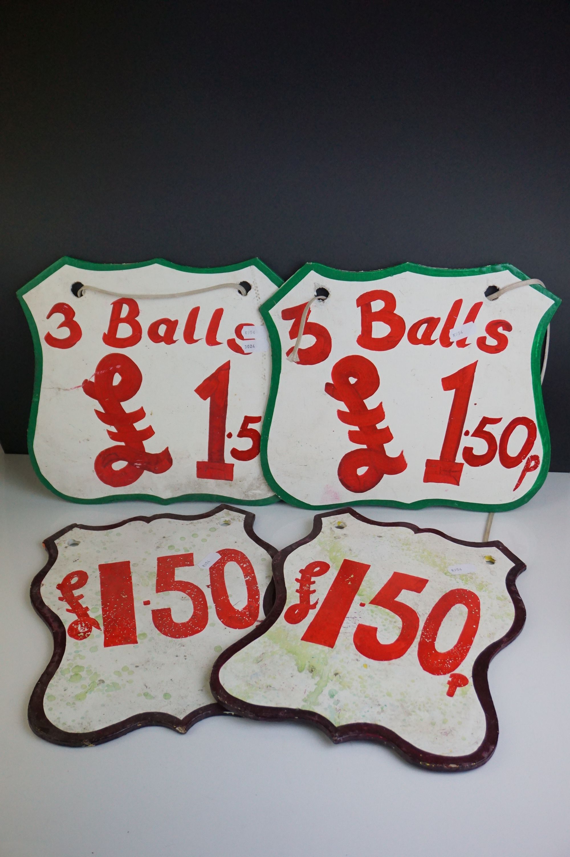 Four Painted Wooden Fairground Price Signs including ' 3 Balls for 1.50 ', between 25cms to 28cms