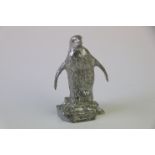 Cast White Metal Penguin on a Rock