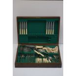 An oak cased silver plated cutlery set.