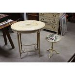 French Oval Table with distressed painted finish and decorated with a cherub and flowers to top,