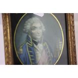 A pair of framed and glazed portraits of a naval officer, possibly Nelson.