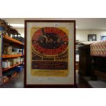 A framed and glazed Jimmy Hendrix Experience print of a poster.