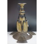 Art Nouveau Style Cast Iron Egyptian Revival Figural Stand raised on a circular stepped base,