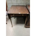 Early 19th century Mahogany Drop-flap Table, with drawer to end and raised on turned tapering legs