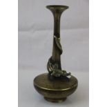 An Antique bronze/brass Chinese vase with serpent decoration to stem .
