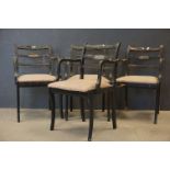 Set of Four Regency Elbow Dining Chairs with drop-in seats and sabre front legs, with a black