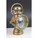 A early 20th century large brass Powell and Hammer car or carriage lamp.