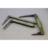 Three 19th century mother of pearl handled folding quill cutters including one Double BI (HG &