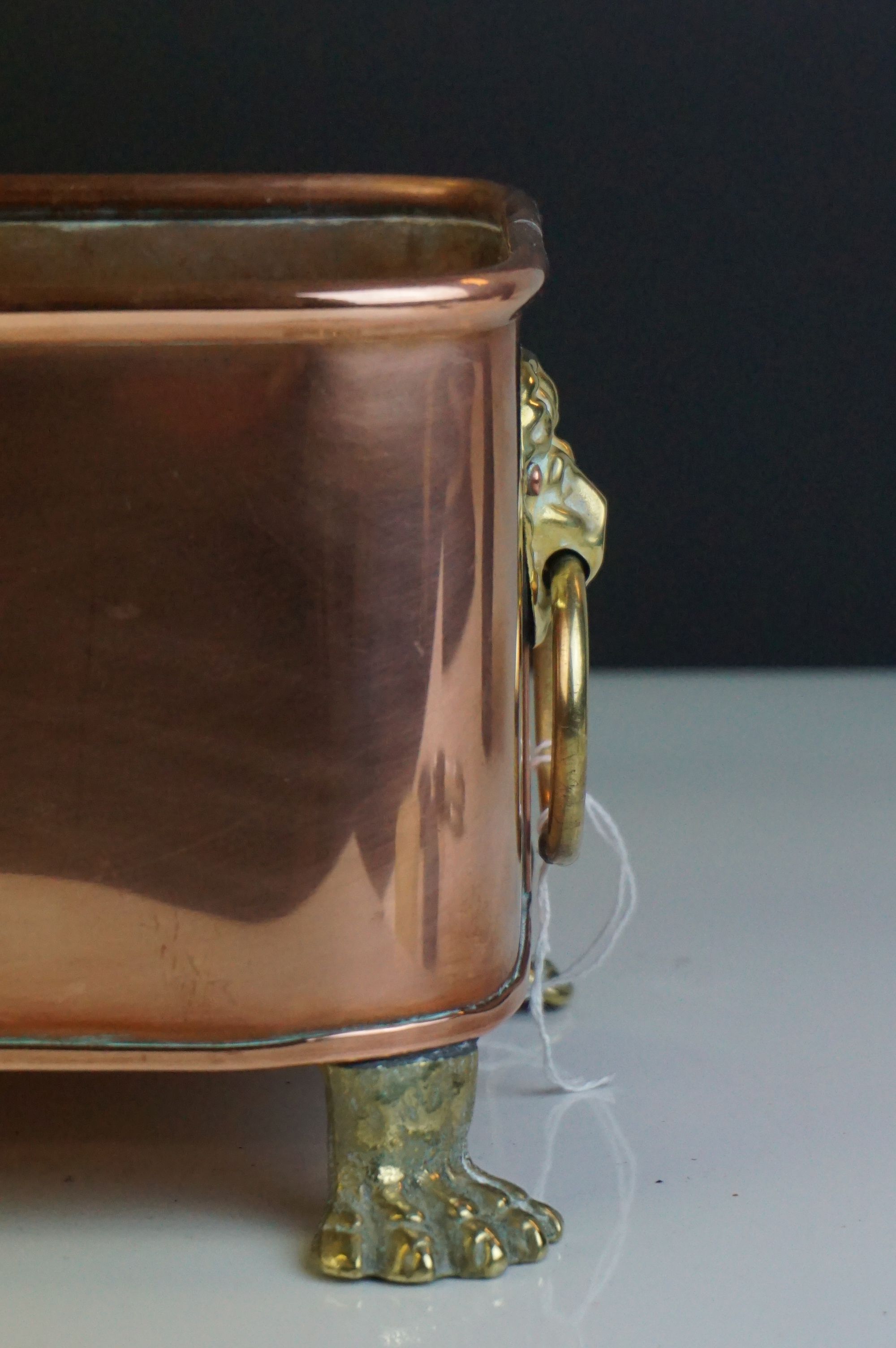 Copper Rectangular Planter with Brass Lion Mask Ring Handles and raised on four brass lion paw feet, - Image 3 of 4