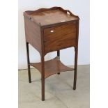 Early 19th century Mahogany Pot Cupboard with Gallery Rail to top and shaped shelf below, raised