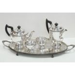 A silver plated oval two handled tray together with a similar teaset etc.