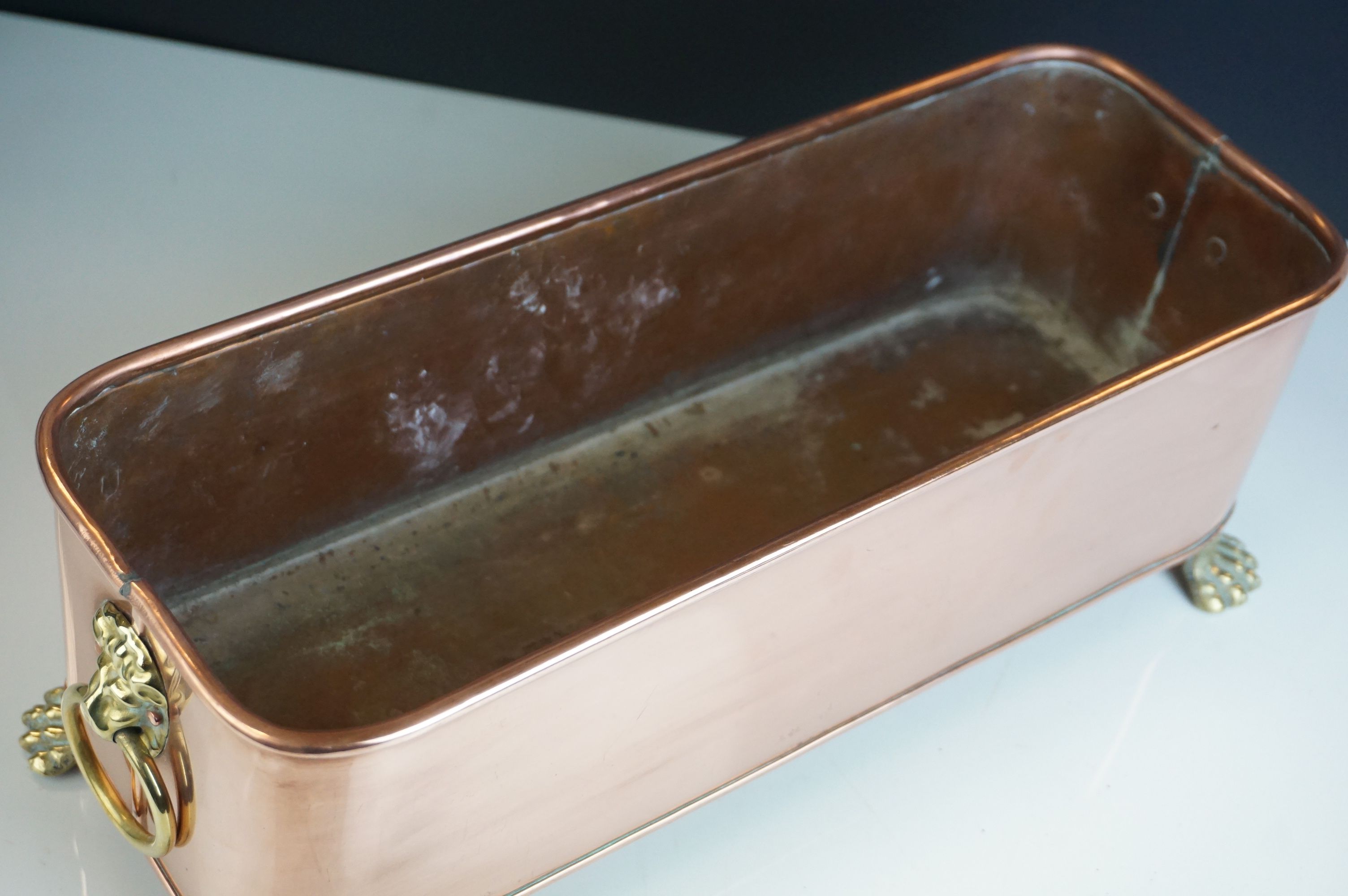 Copper Rectangular Planter with Brass Lion Mask Ring Handles and raised on four brass lion paw feet, - Image 4 of 4
