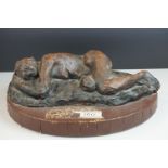 A contemporary sculpture in bronzed terracotta titled Janet sleeping
