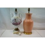 A pink ground ceramic baluster shaped lamp together with a Richard Ginori urn shaped lamp with