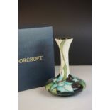 Boxed Moorcroft Pottery Squat Bottle Neck Vase in the Sea Holly pattern, designed by Emma Bossons