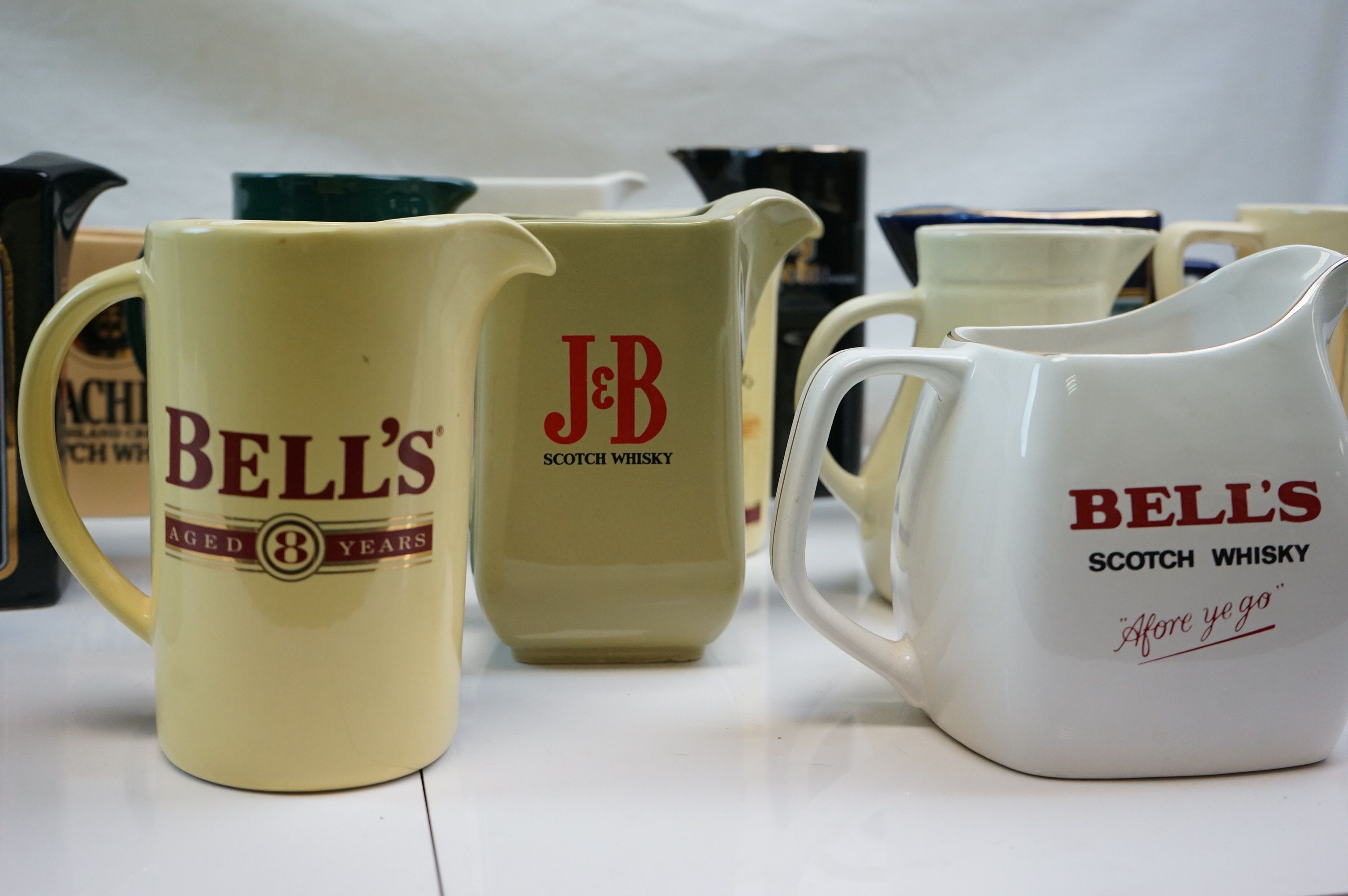 Collection of Fifteen Ceramic Pub Advertising Jugs including Wade and Martell Grand National Void - Image 2 of 5