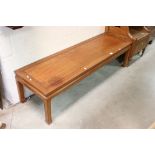 Chinese Hardwood Long Coffee Table raised on square legs, 155cms long x 41cms high