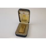 Boxed Dunhill Gold plated Lighter, complete with instruction booklet