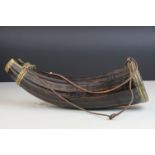 An antique wooden powder flask with ribbed decoration.