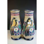 Pair of Amphora Vases of baluster form, painted in coloured enamels with birds and foliage, marked