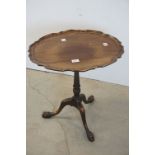 George III style Mahogany Oval Wine / Lamp Table with pie-crust edge, raised on a turned column