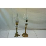 Two Late 19th century Brass Oil Lamps with glass wells, one with frilled edge vaseline glass shade