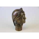 A bronze walking stick handle in the form of Dante.