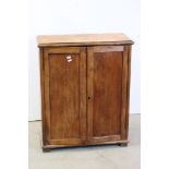 19th century Pine Cupboard, the two panel doors opening to reveal two shelves, 65cms wide x 80cms