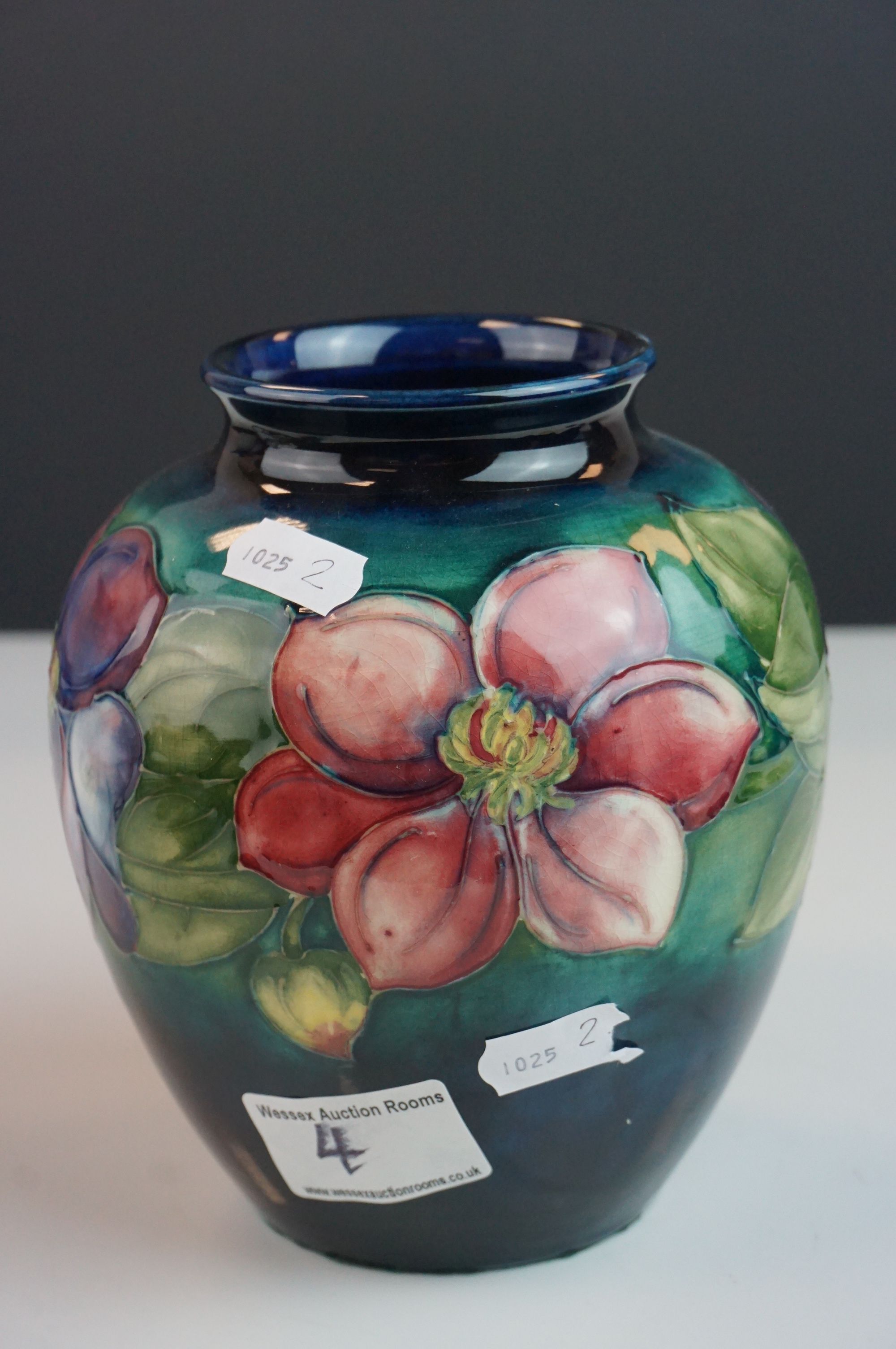 Moorcroft Globular Vase in the Clematis pattern on a green ground, Moorcroft signature to base and - Image 2 of 7