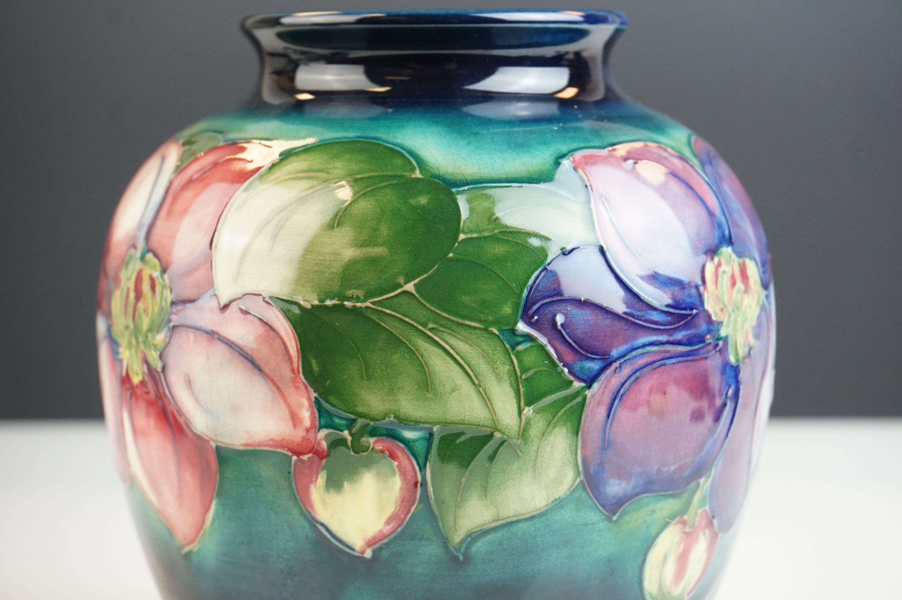 Moorcroft Globular Vase in the Clematis pattern on a green ground, Moorcroft signature to base and - Image 7 of 7
