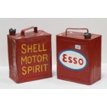 Two vintage petrol cans Shell and Esso, both repainted.