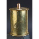 a brass trench art lidded pot with etched decoration made from a 1917 shell case.