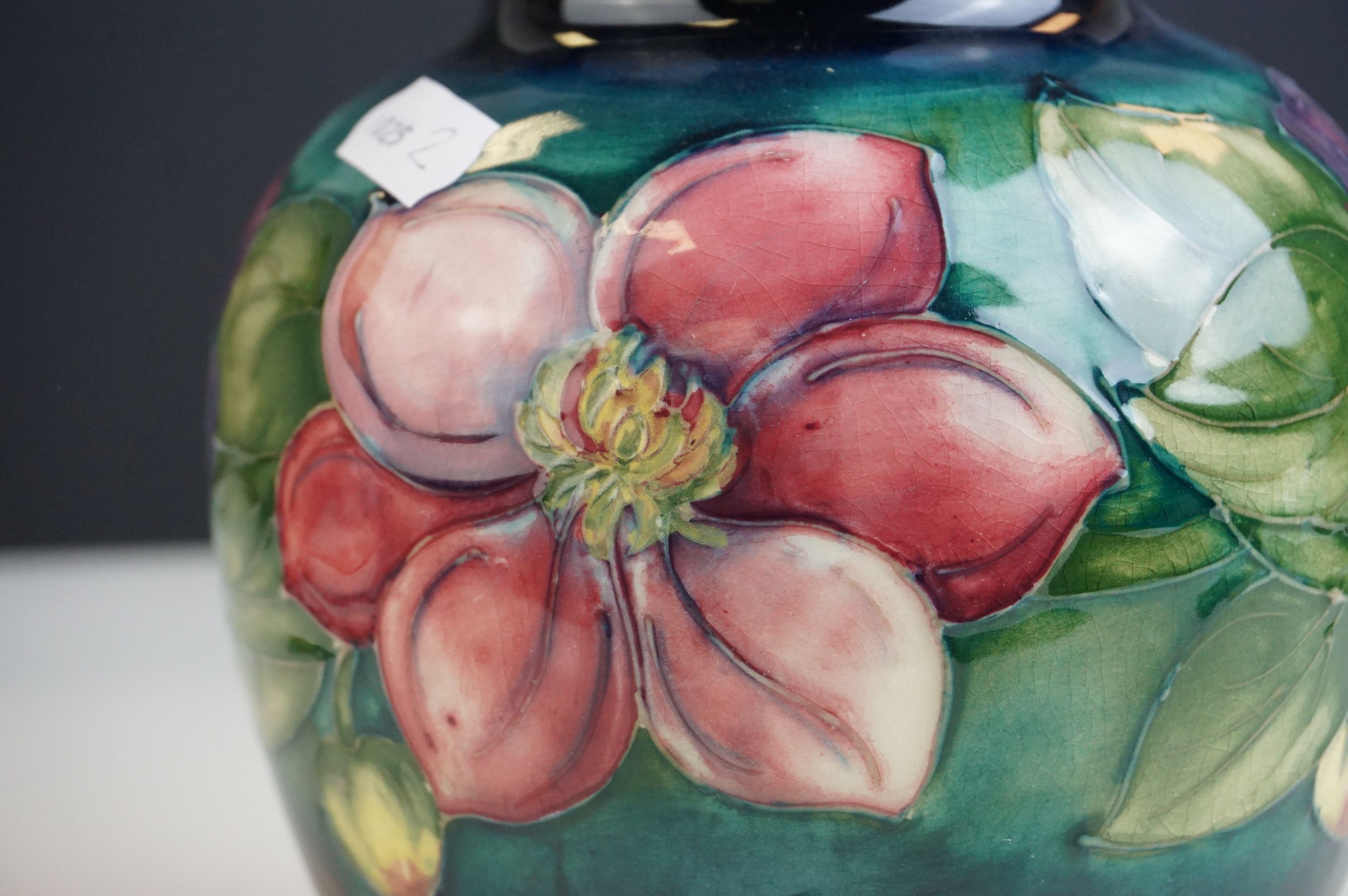 Moorcroft Globular Vase in the Clematis pattern on a green ground, Moorcroft signature to base and - Image 5 of 7
