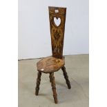 19th century Spinning Chair with a heart pierced back, stained and painted finish depicting mythical