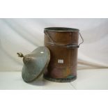A vintage copper bucket with carrying handle and matched lid.