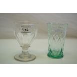 A whitefriars style green gl;ass goblet together with an antique lead crystal rummer.