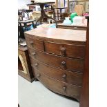 Early 19th century Mahogany Bow Fronted Chest of Drawers, with turned wooden handles and raised on