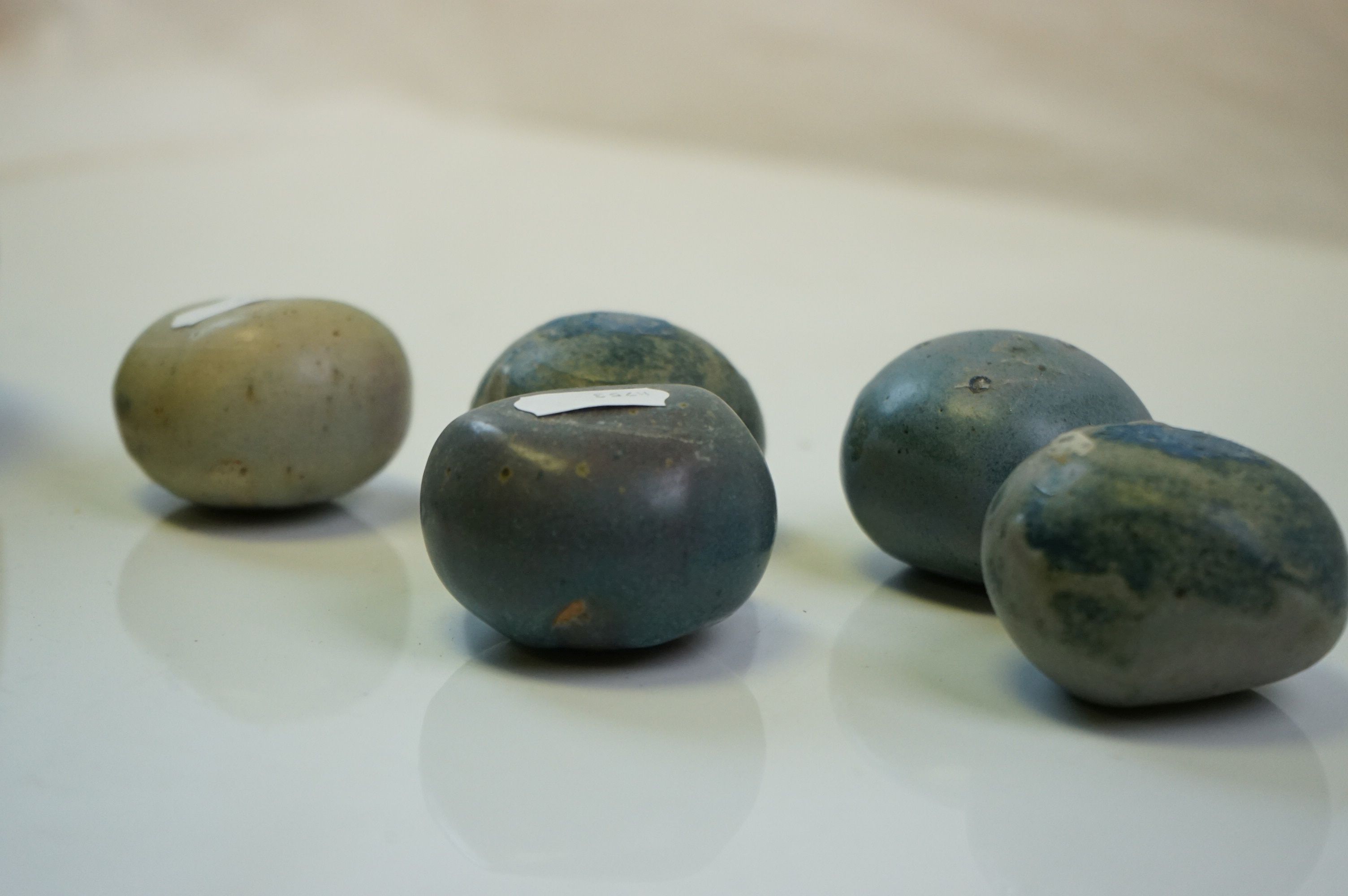 Five studio pottery sculptures in the form of stones together with one other larger no makers mark. - Image 3 of 5