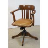 Late 19th / Early 20th century Oak Captains Swivel Chair with iron mechanism and Tan Leather Seated